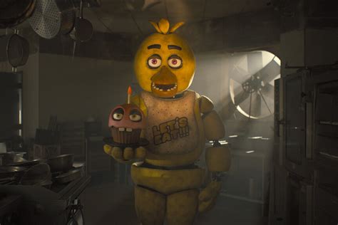 why does chica have a cupcake|what is chica's cupcake name.